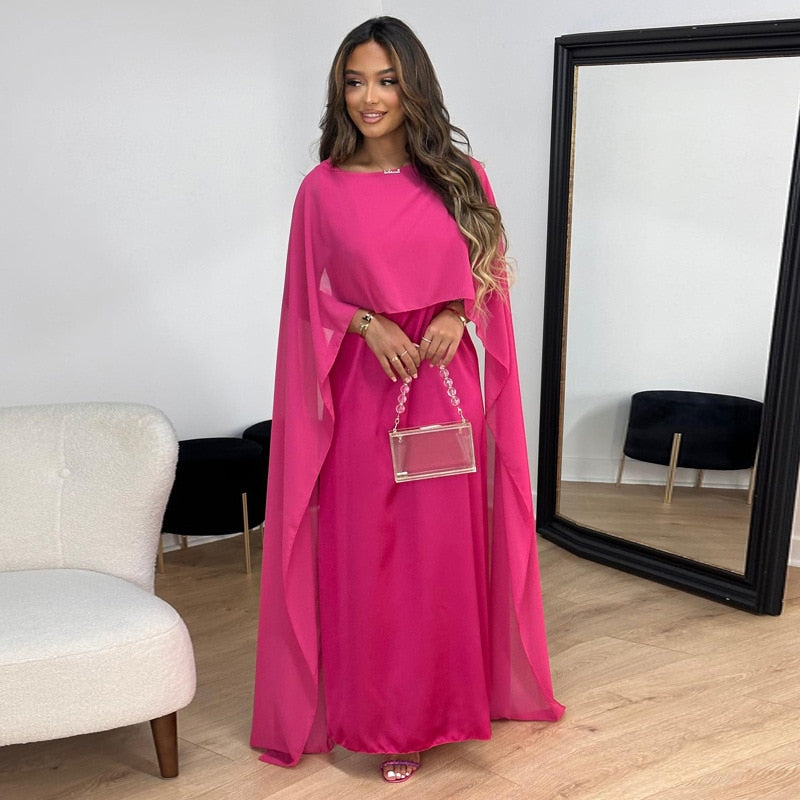 Experience the elegance and comfort of the Robe Solanj. This loose swing robe drapes beautifully, inspired by traditional Middle Eastern designs. Indulge in a luxurious and effortless style. Perfect for lounging or a day out, this robe will elevate your wardrobe and your mood!