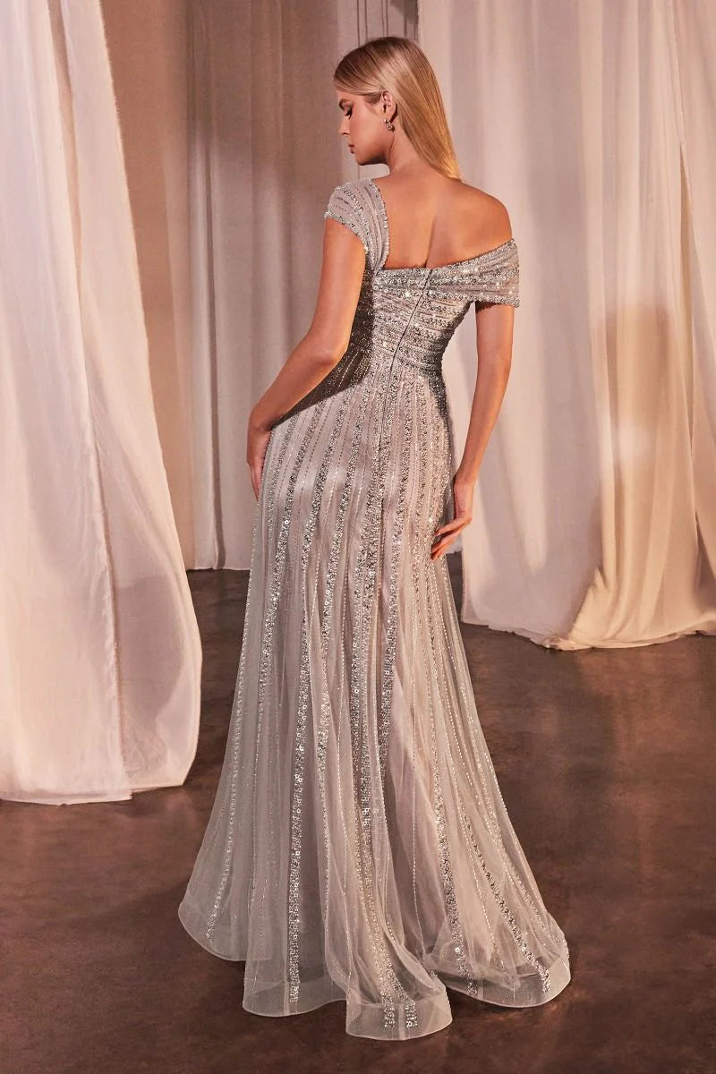 Indulge in elegance with our Chiara Gown, designed for the daring and bold. Featuring an off-the-shoulder asymmetrical bodice with dazzling horizontal beading, and a layered tulle skirt adorned with a vertical beaded motif, this dress exudes modern glamour. Whether it's a gala or special evening, make a statement in this captivating and timeless piece.