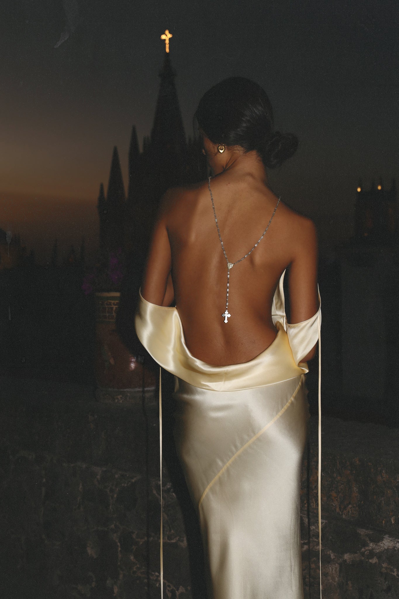 Indulge in sophistication and allure with our Elowen Evening Robe. This elegant and sexy dress features a stunning open back, delicate spaghetti straps, and a solid color design. Perfect for making a statement at any formal event.