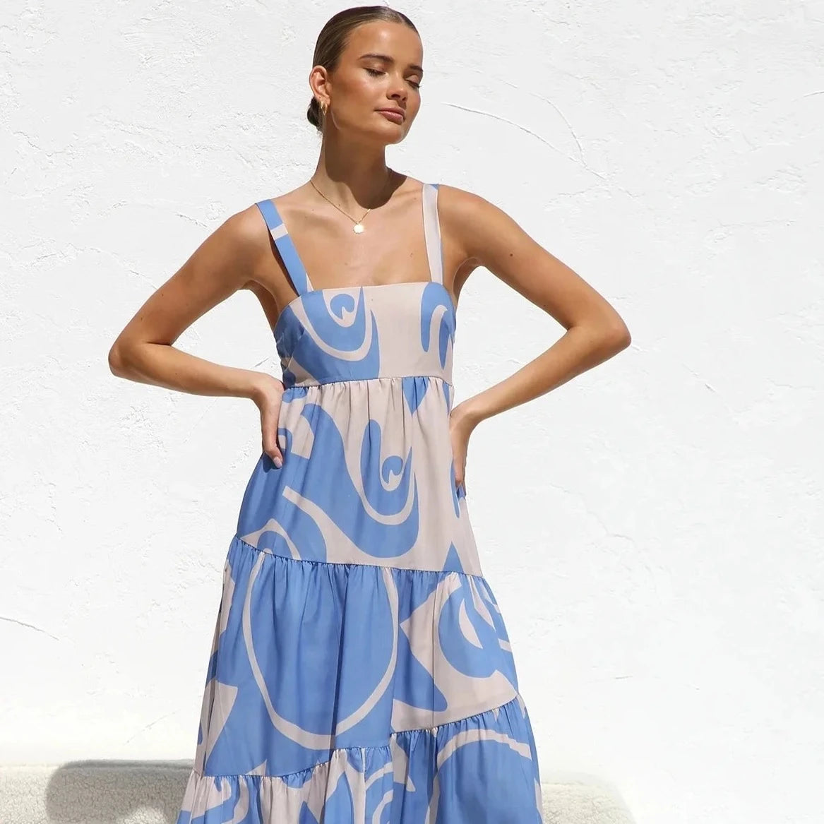 The Caprice Maxi Dress is the perfect dress for any beach party or summer holiday. Its vibrant and playful print will make a statement while its sleeveless and long design exudes elegance and charm. Stay on-trend and comfortable in this must-have fashion piece.