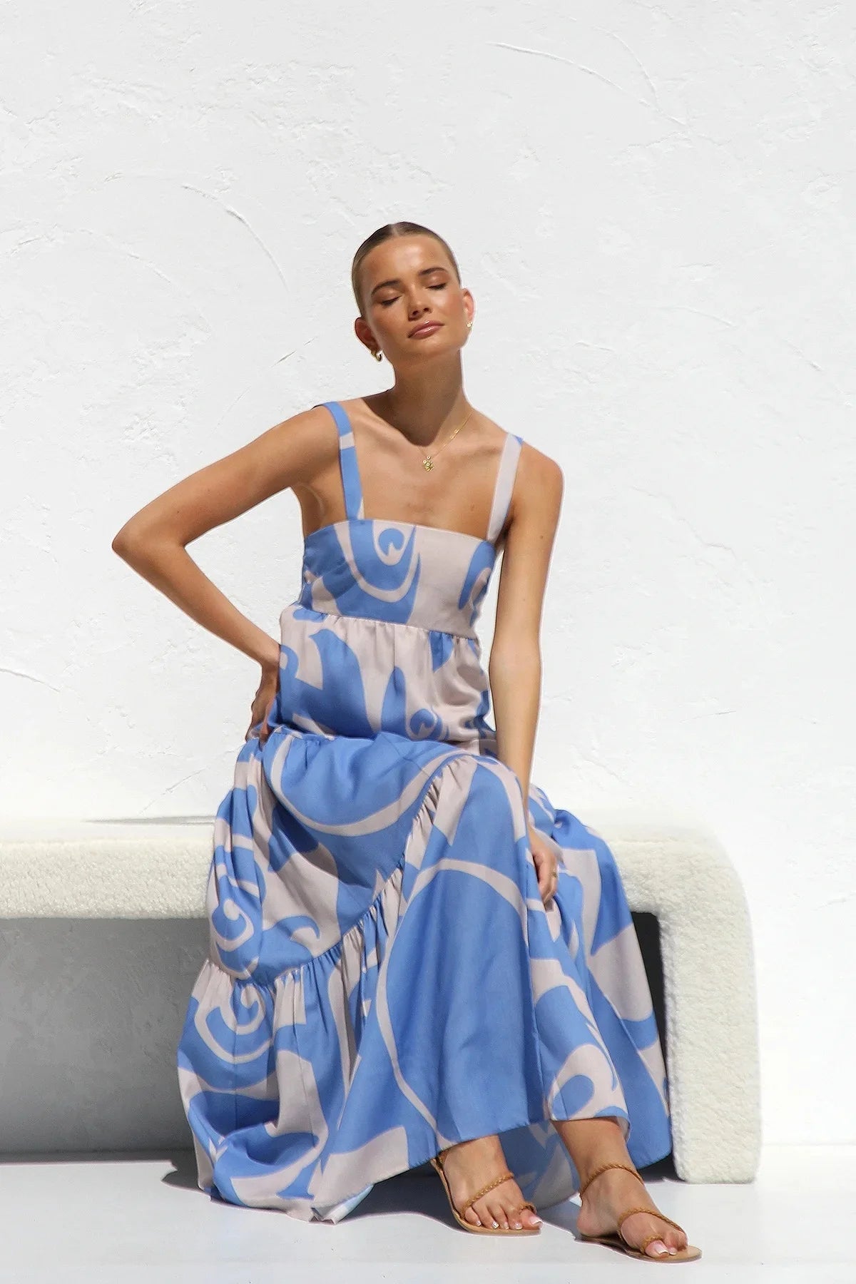 The Caprice Maxi Dress is the perfect dress for any beach party or summer holiday. Its vibrant and playful print will make a statement while its sleeveless and long design exudes elegance and charm. Stay on-trend and comfortable in this must-have fashion piece.