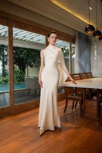 Experience the elegance and seduction of classic Hollywood films with the Angelie Silk Dress. Made with timeless silk and featuring two contrasting colors, this dress exudes a special and alluring charm. Make a statement with Angelie and capture all eyes in the room.