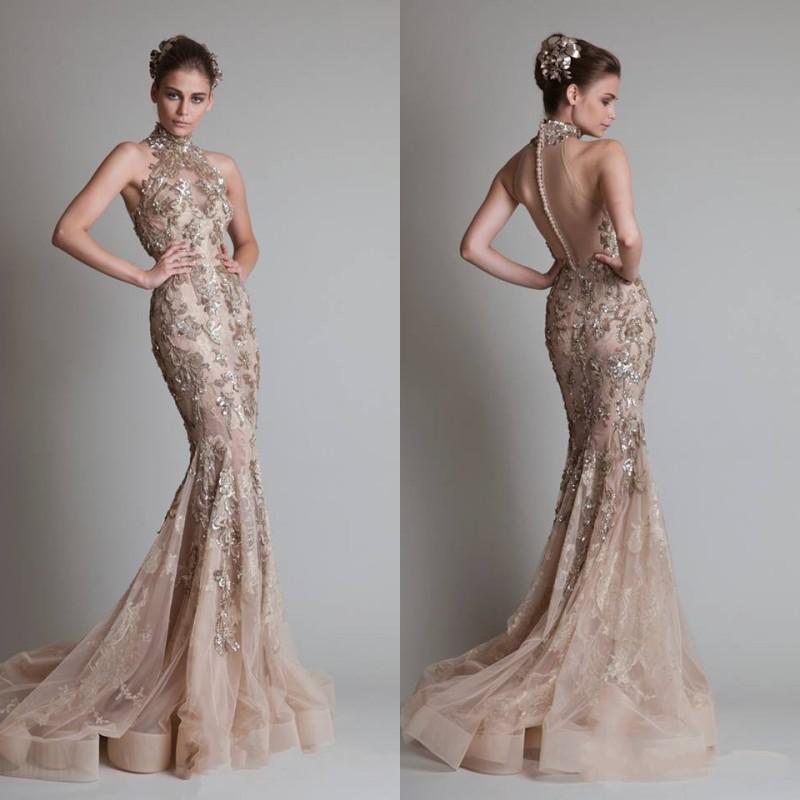 Robe Addison is a luxurious and exclusive gown, embellished with intricate golden details. This elegant robe exudes opulence and sophistication, making it the perfect statement piece for any special occasion. Elevate your style with this breathtakingly beautiful piece from our premium collection.