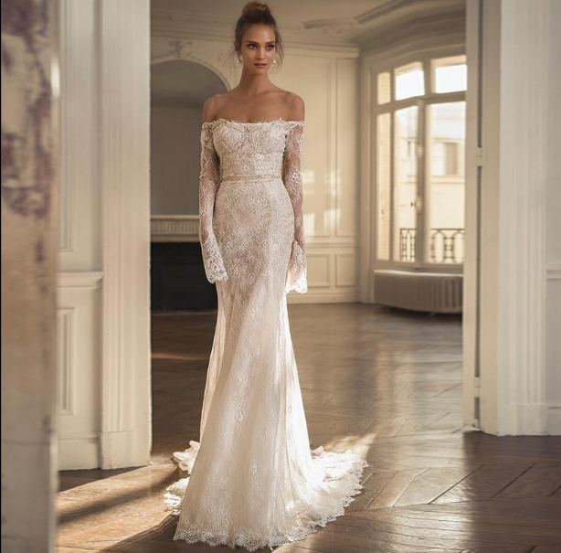 The Robe Margrit is a stunning lace wedding gown, perfect for the elegant bride. This exquisite gown features delicate lace details, adding a touch of romance and sophistication to your special day. Expertly crafted, the Robe Margrit is designed to make you feel beautiful and confident as you say "I do".