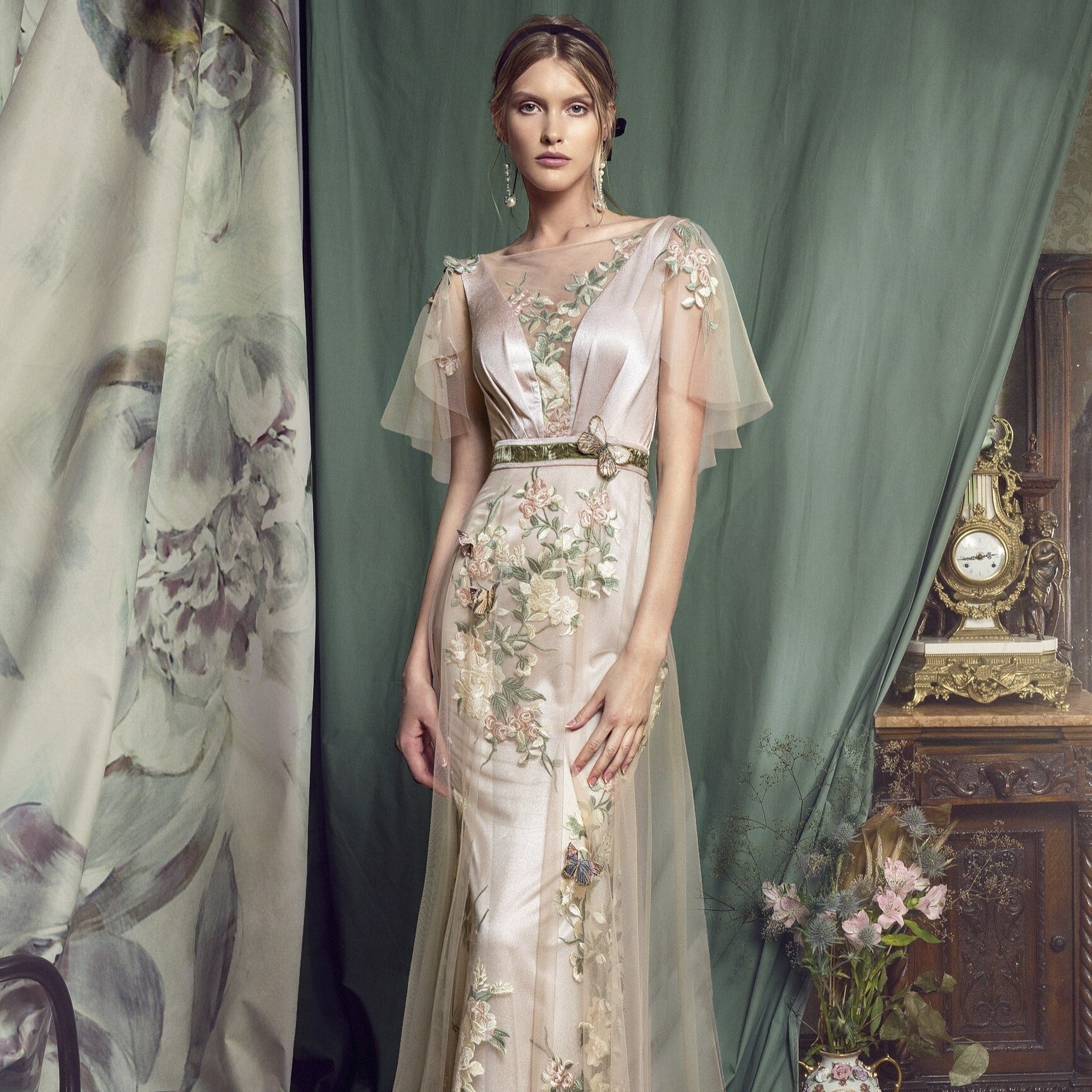 Introducing the Robe Amandine, a chic vintage evening gown that exudes elegance. Crafted with intricate details and luxurious materials, this gown is perfect for any special occasion. Make a statement and turn heads with this exclusive piece.