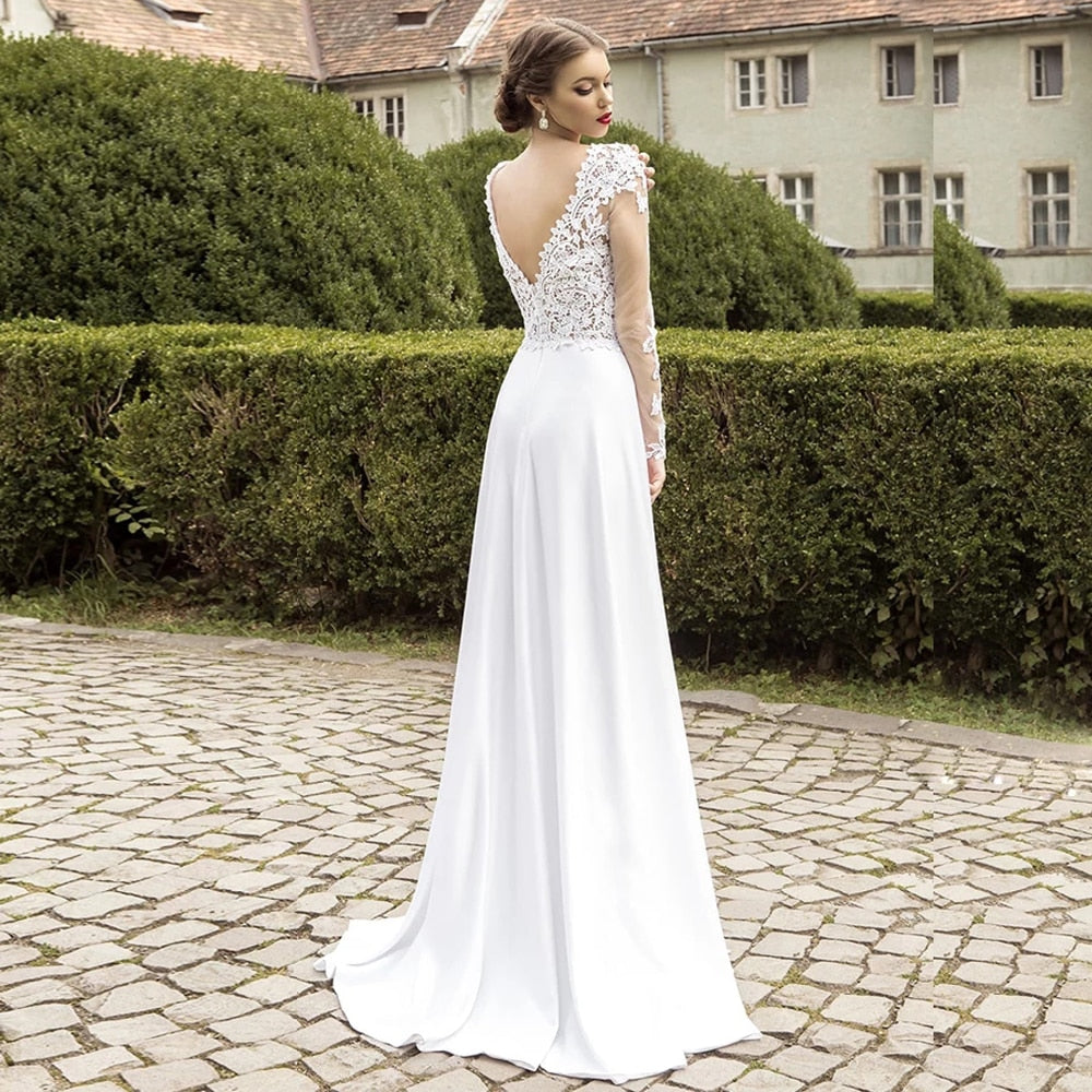 Introducing the beautiful Robe Denece, a stunning embroidered wedding bridal dress. Made with elegant details, this dress will make you feel like a true bride on your special day. With its delicate embroidery and timeless design, this dress is perfect for any bride looking for a classic and sophisticated look.