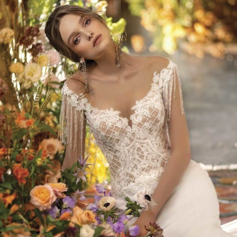 Unleash your inner mermaid with our stunning Robe Fiona! This beautiful white gown is crafted with delicate lace, adding a touch of fantasy to your wardrobe. Perfect for any special occasion, it will make you feel like a mermaid princess. Be the center of attention and evoke strong emotions with this enchanting robe!