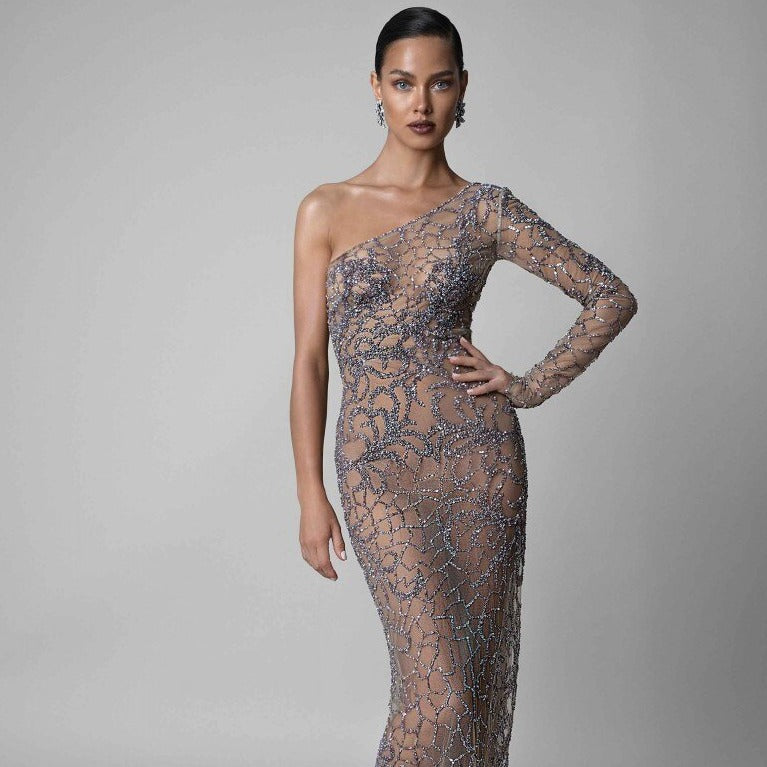 Let your inner mermaid shine with Layla! Our sparkling evening gown will have you feeling like a goddess with every glimmer of its shimmering fabric. Perfect for any special occasion, Layla will make you the belle of the ball — no tail required!