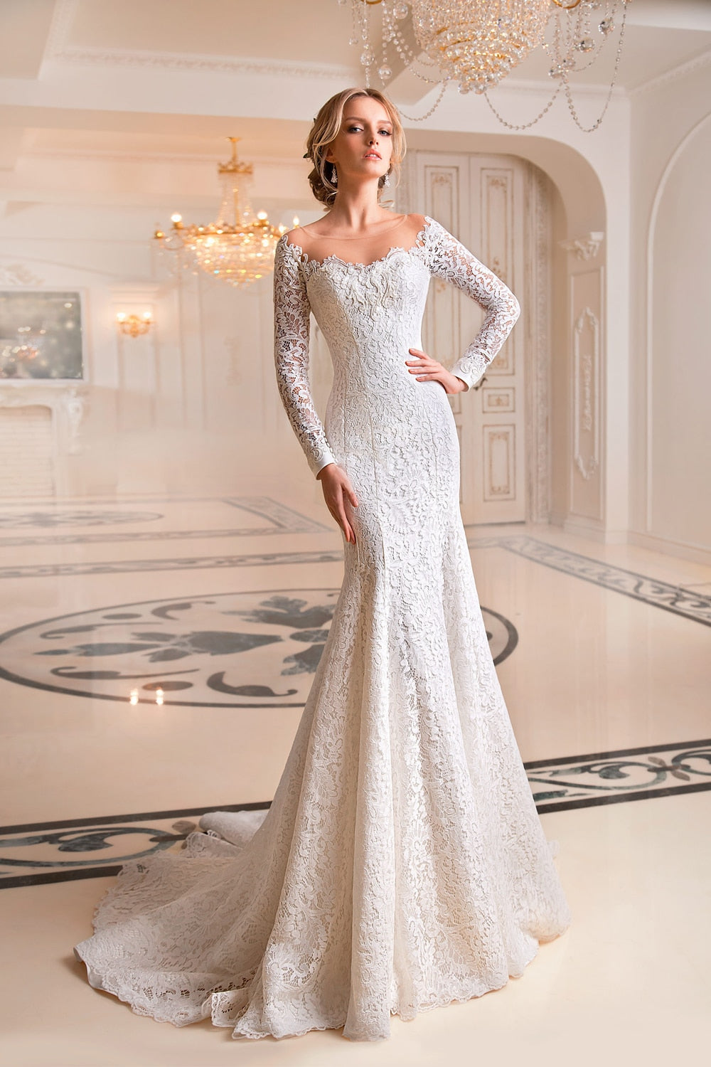 The Robe Willow is a stunning white bridal gown crafted with intricate lace embroidery, perfect for a French-inspired couture look. With its elegant mermaid silhouette, this gown is a dream for any bride. Feel like a true princess on your special day with the Robe Willow.