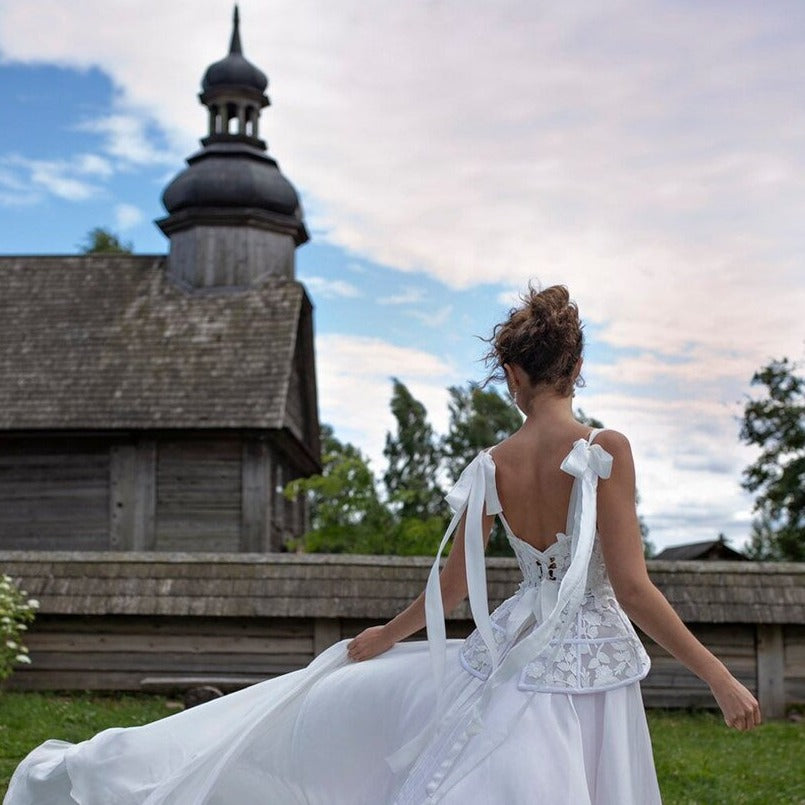 Introducing Dress Ania, the perfect bridal gown for your special day! This stunning gown will make you feel like a true queen as you walk down the aisle. With its elegant design and intricate details, it's sure to turn heads and leave a lasting impression. Say "I do" to Dress Ania and make your wedding day truly unforgettable!