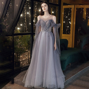 Elevate your style with our Robe Tarra - a stunning cocktail gown that will make you feel beautiful and confident. Designed with intricate details, this gown is perfect for any special occasion. Experience the ultimate sophistication and stand out in the crowd.