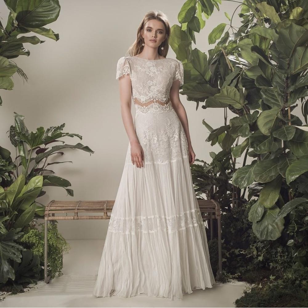 This exquisite Robe Robbyn gown made from delicate ivory lace adds an air of sophistication and femininity to your wardrobe. Boasting an intricate boho pattern hand-crafted with attention to detail, it is the perfect way to make a statement. Elevate your style this season with an understated yet luxurious gown.