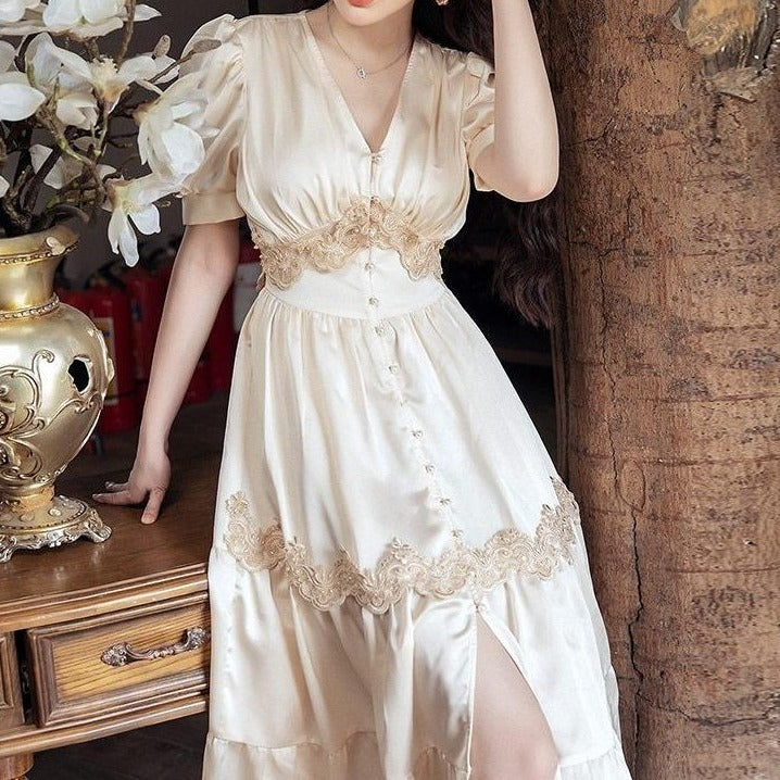 This elegant evening dress is the perfect choice for any special occasion. Made from high-quality satin fabric, it features a flattering V-neck and short sleeves adorned with intricate appliques. The custom-made fit ensures a perfect silhouette, adding a touch of luxury and sophistication to your look.