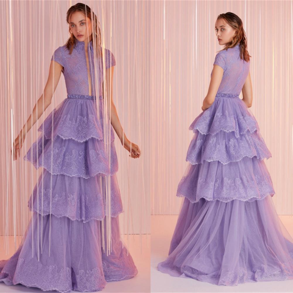 Get ready to steal the spotlight in the Robe Karah! With its elegant ball gown design, this dress exudes French fashion. The stunning purple hue adds a touch of sophistication to your look, making you the star of the show. Time to make a statement, fashionista!