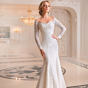 The Robe Willow is a stunning white bridal gown crafted with intricate lace embroidery, perfect for a French-inspired couture look. With its elegant mermaid silhouette, this gown is a dream for any bride. Feel like a true princess on your special day with the Robe Willow.