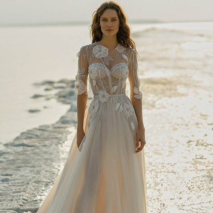 Feel like royalty in the Robe Dabria - a unique bridal gown that will be sure to make you stand out on your special day. Get lost in time and space in this gorgeous gown and make a lasting impression. With its intricate details and timeless style, the Robe Dabria will be remembered forever.