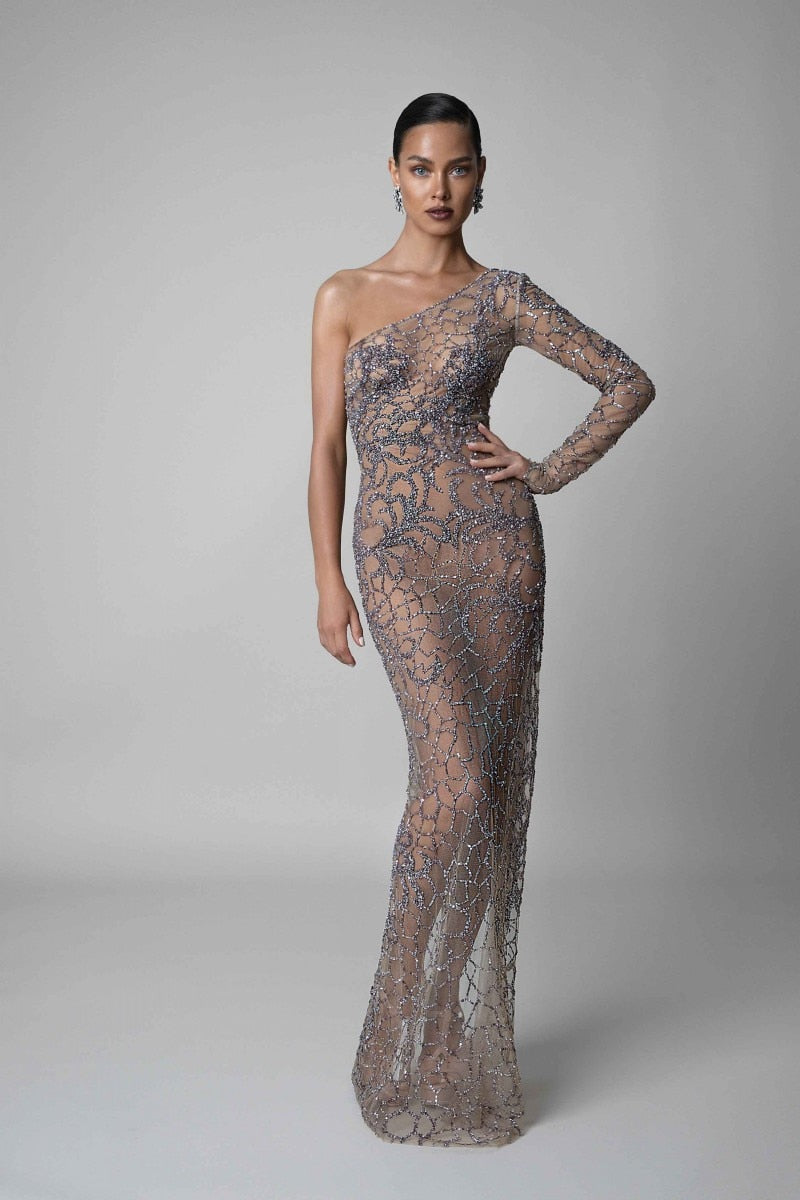 Let your inner mermaid shine with Layla! Our sparkling evening gown will have you feeling like a goddess with every glimmer of its shimmering fabric. Perfect for any special occasion, Layla will make you the belle of the ball — no tail required!