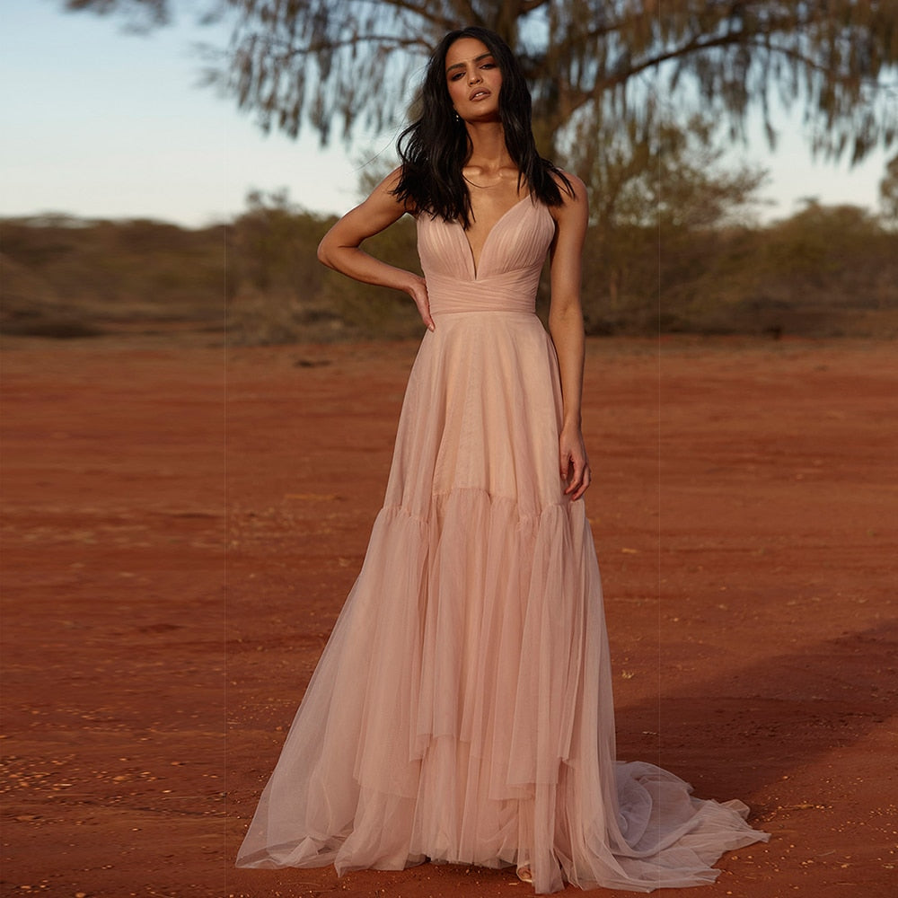 Indulge in luxurious risk-taking with the Robe Merry! Conquer the evening in this cocktail desert pink princess gown, perfect for making a statement and standing out in any crowd. Feel like royalty and unleash your inner daring spirit. Limited quantities available, so grab yours now!