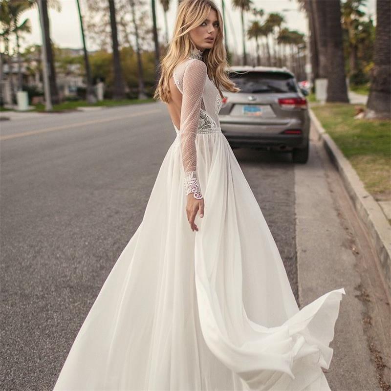 "Get ready to become the dreamiest bride in town with the Robe Ibernia! This white bridal dress will make you feel like you're walking on clouds on your special day. Say "I do" to this dreamy robe! 