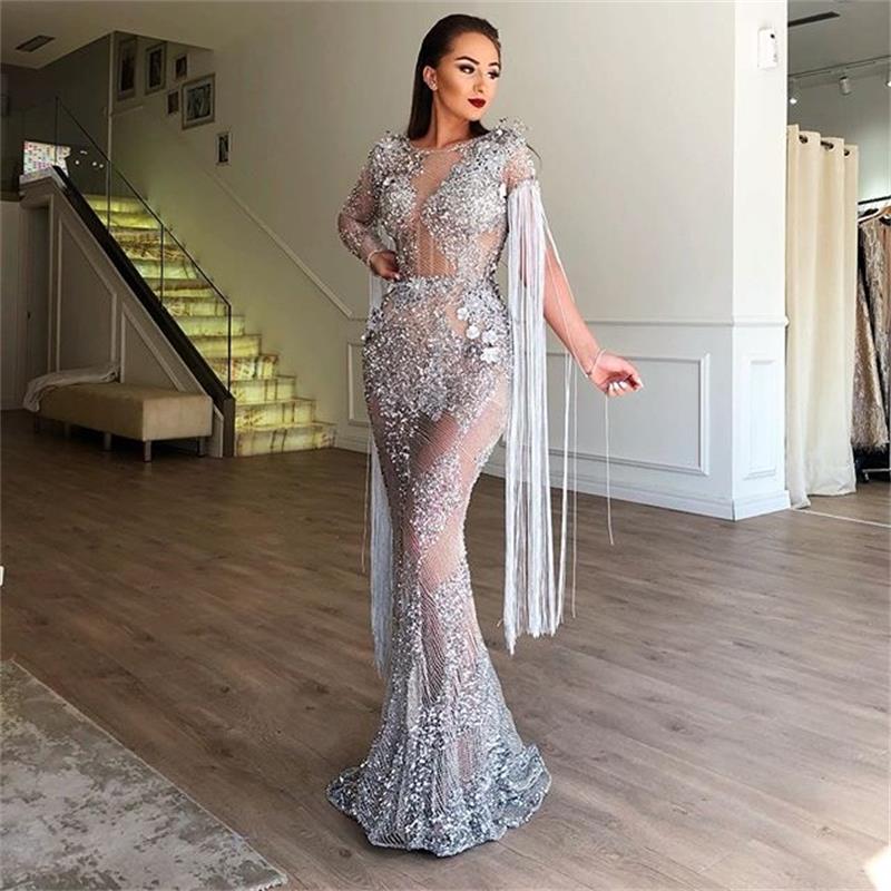 Indulge in pure luxury with our Robe Lareine. This sparkling evening mermaid gown exudes chic and sexy sophistication. Perfect for making a statement at any glamorous event, this dress will hug your curves and make you shine like a star. Elevate your wardrobe with this exclusive piece.