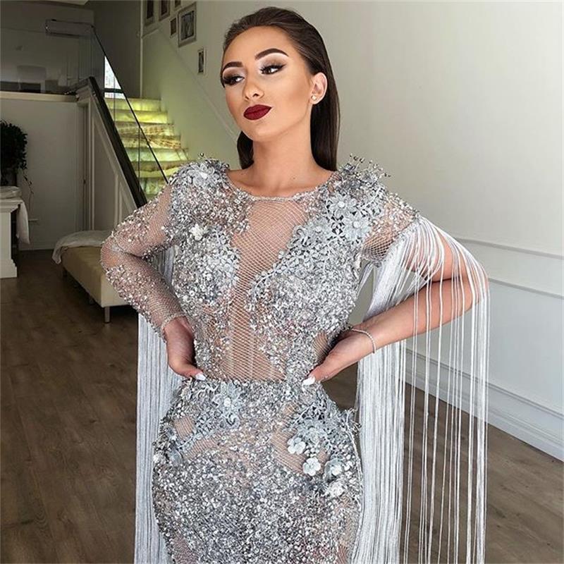 Indulge in pure luxury with our Robe Lareine. This sparkling evening mermaid gown exudes chic and sexy sophistication. Perfect for making a statement at any glamorous event, this dress will hug your curves and make you shine like a star. Elevate your wardrobe with this exclusive piece.