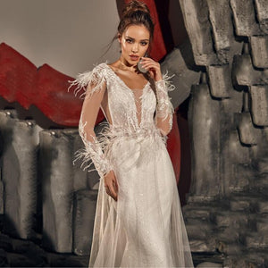 Transform into a blushing bride with our ivory Robe Chamelea bridal gown. Feel confident and elegant as you walk down the aisle in this exquisite, timeless piece. Perfect for creating unforgettable memories on your special day.