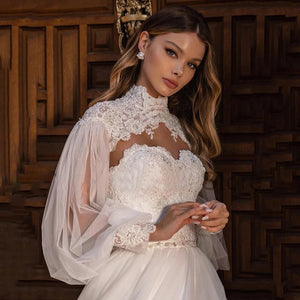 Indulge in luxury with our Robe Lacramioara. This elegant, chic gown features exquisite embroidery, long sleeves, and a long train, all of which add a touch of sophistication to your look. Crafted with premium quality, it is perfect for any special occasion. Elevate your style today and make a statement with Robe Lacramioara.