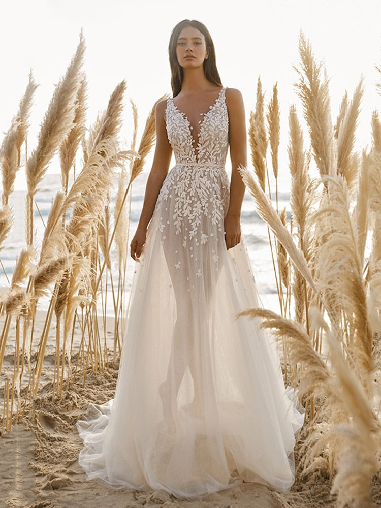 Indulge in the delicate beauty of our Robe Collins. This elegant lace fairy wedding gown exudes sophistication and charm, perfect for the modern bride. Be the epitome of chic in this one-of-a-kind bridal ensemble. Experience the luxury of a handcrafted gown that will make you feel like a work of art on your special day.