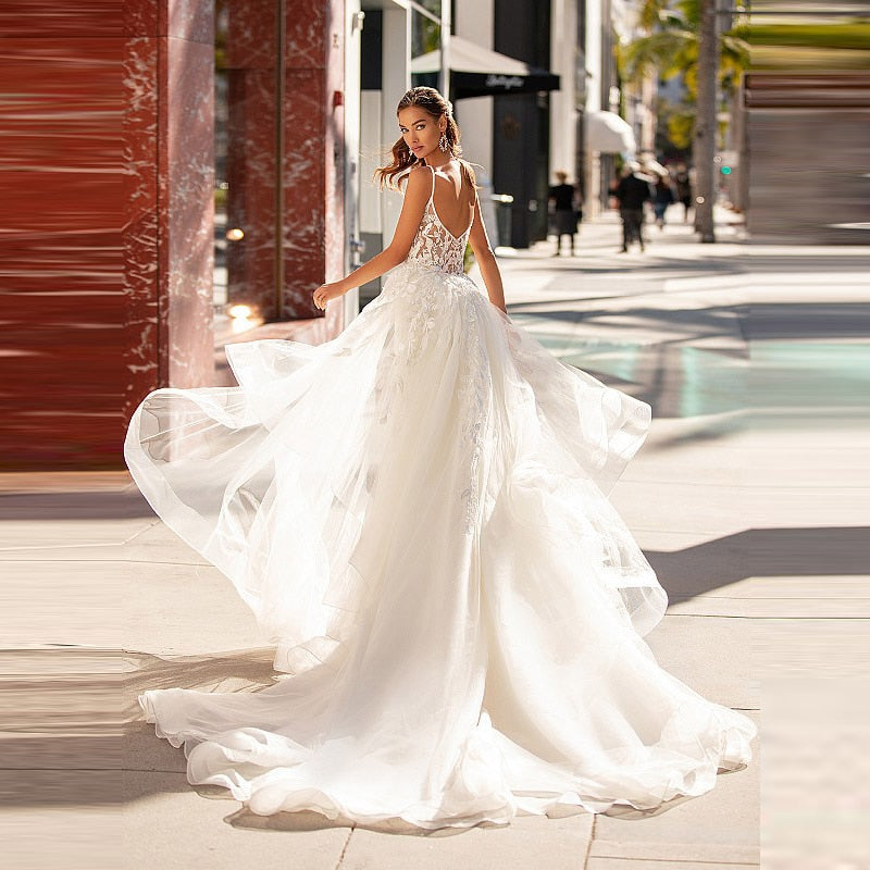 Indulge in the exquisite elegance of the Robe Noa. This bridal wedding gown features delicately crafted lace for a sophisticated and luxurious look. Perfect for any bride looking for a touch of romance and grace on her special day.