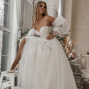 Make a stunning entrance on your special day with our Robe Pamina. This beautiful tulle bridal gown will make you feel like a princess as you walk down the aisle. Its delicate fabric and elegant design will leave everyone in awe. Look and feel your best with our Robe Pamina.