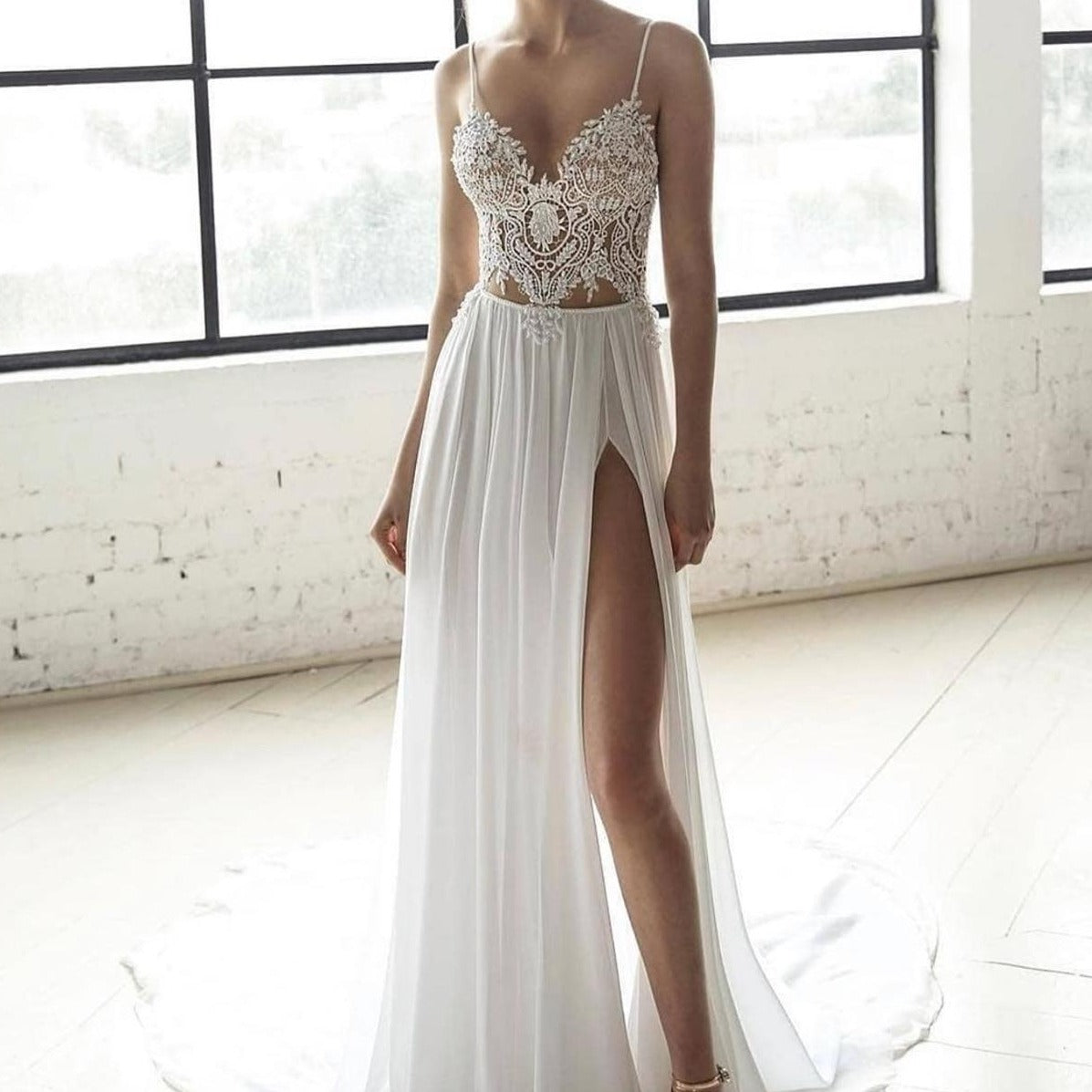 This bohemian wedding dress is perfect for the free-spirited bride. The Robe Bridget features a flowy silhouette and delicate lace details, creating a romantic and effortless look. Feel comfortable and beautiful on your special day with this unique gown.