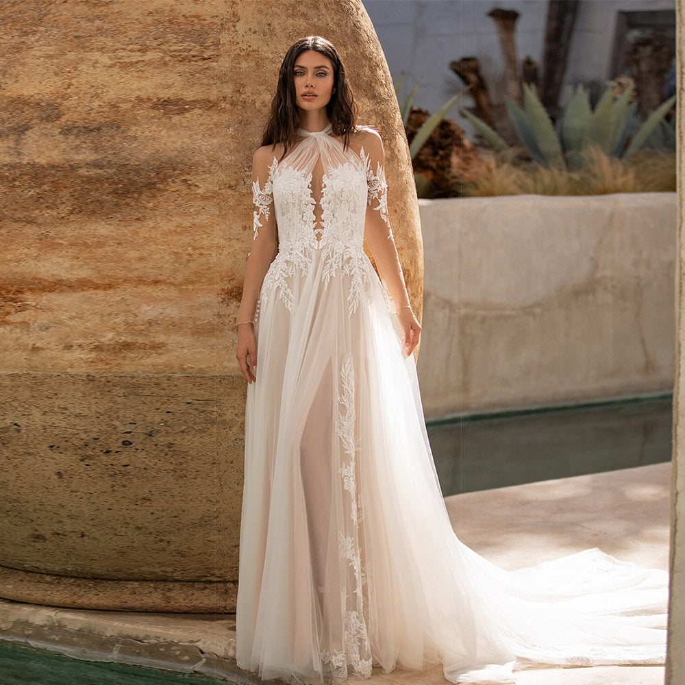 Introducing Robe Merri, the perfect bridal gown crafted with exquisite lace and soft material. Feel pure elegance in white fantasy and look chic in this beautiful wedding dress. Be a blushing bride on your special day.