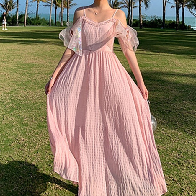 Look daring and feminine in the Robe Maxxy! This chic dress features a fairy aesthetic, whimsical cottagecore design and sexy silhouette for a bold summer look perfect for all occasions. Express your inner risk-taker with confidence!