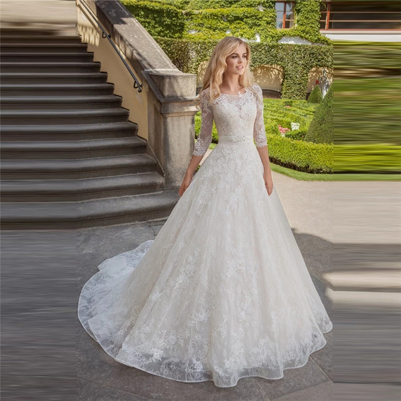 Presenting the Robe Meena, a stunning bridal gown with timeless elegance. This gorgeous dress is perfect for any bride looking to make a statement on her special day. With its elegant design and high-quality materials, the Robe Meena is sure to make you feel like a true princess. Don't settle for anything less on your wedding day.