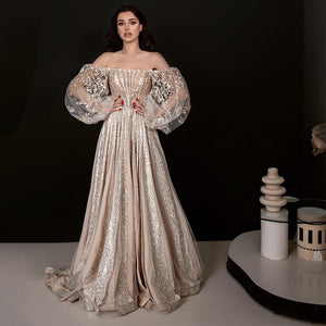 Look elegant and chic at your special occasion with the Fosette robe. This sparkling champagne prom dress will make you shine, making heads turn. Its unique design and color will make you stand out from the crowd. Perfect for any special event, this robe exudes confidence and sophistication.