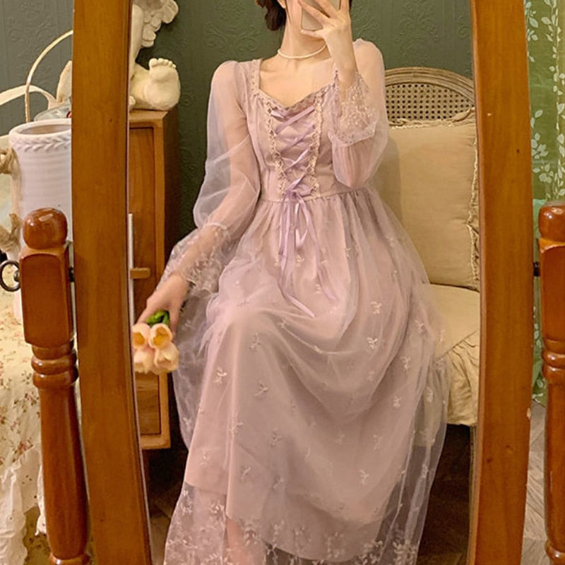 Expertly crafted with vintage French lace and delicate tulle, the Robe Lulie is a dreamy gown that exudes elegance and sophistication. Its intricate details and whimsical charm make it the perfect choice for a romantic occasion. Revel in the beauty and luxury of this timeless piece.