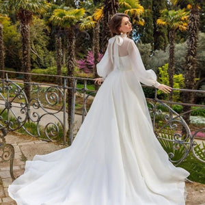 Transform into an ethereal vision with our Robe Iqra. This elegant chic bridal gown features long sleeves and a flattering A-line silhouette, making it the perfect choice for any bride. Walk down the aisle in style and grace with its luxurious design and feel like a true work of art on your special day.