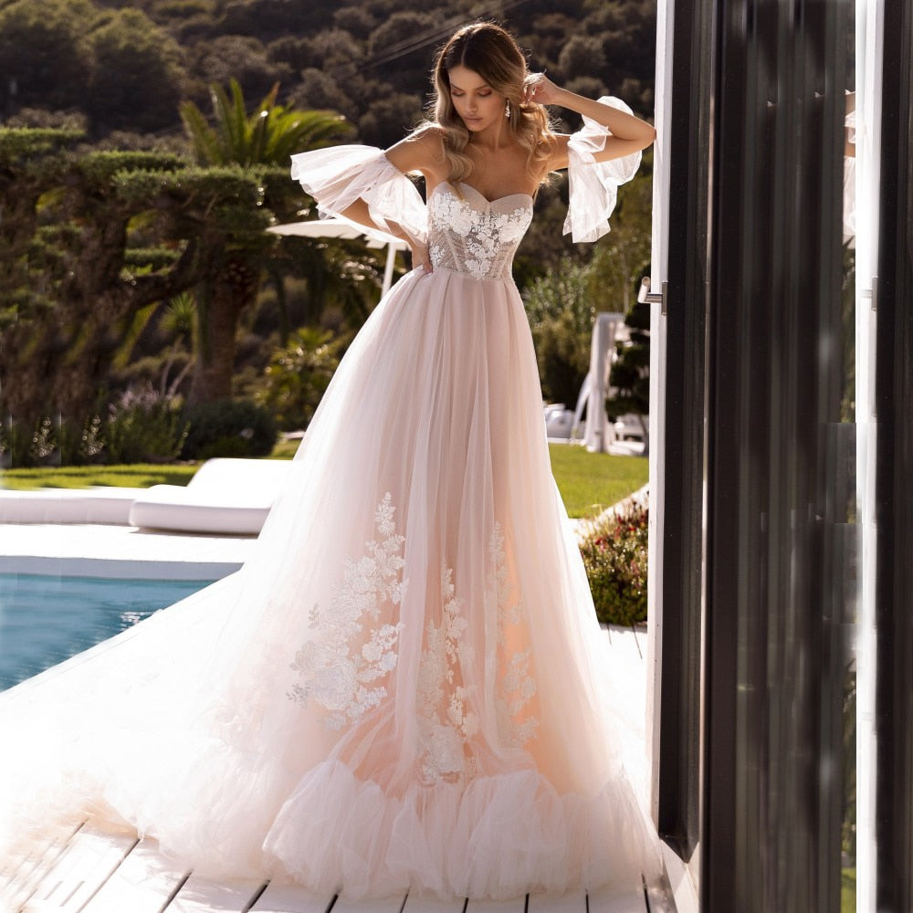 Looking for the perfect wedding dress? Look no further! Our Robe Leia is a stunning and elegant enchanted gown that will make you feel like a real-life princess on your special day. With its intricate details and luxurious feel, this dress will surely leave a lasting impression.