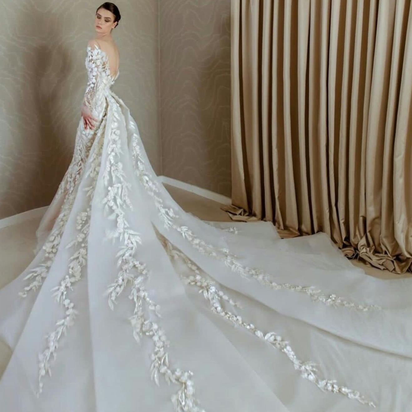 "Feel like royalty in our Robe Idris - the perfect gown for your special day. With its elegant design and regal feel, you'll be sure to steal the show. Fit for a queen (or king!), our Robe Idris will elevate your wedding look to the next level."