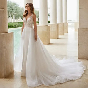 Rafaella Robe is the perfect choice for the modern bride. The 2-in-1 design features an elegant detachable skirt that can be easily removed to create a versatile look. With a lovely beading, this dress is perfect for your special occasion.