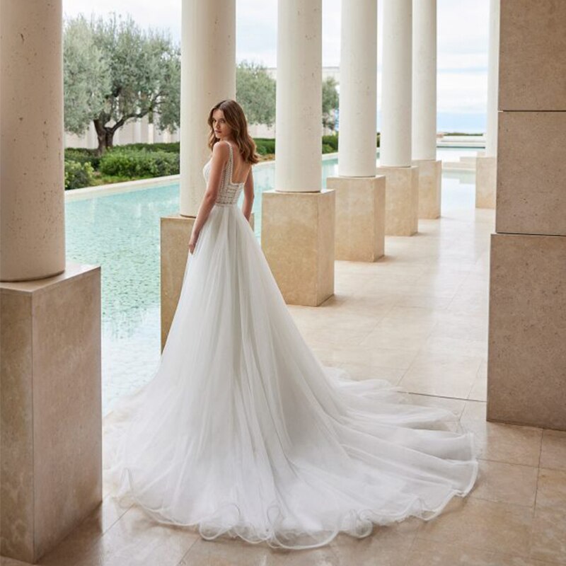 Rafaella Robe is the perfect choice for the modern bride. The 2-in-1 design features an elegant detachable skirt that can be easily removed to create a versatile look. With a lovely beading, this dress is perfect for your special occasion.