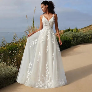 Indulge in luxury with our Robe Velvete, a mermaid wedding dress with delicate straps and intricate appliques. Exude confidence and sensuality on your special day with this sexy piece.