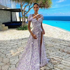 Introducing Robe Milena - the epitome of elegance and sophistication. This maxi dress boasts a chic, floral design that exudes luxury and refinement. Elevate any occasion with this timeless piece that will make you feel like a work of art.