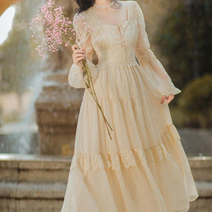 The Robe Roselle is a versatile and sophisticated addition to any wardrobe. With its French belted design, lantern sleeves, and vintage gauze material, this dress exudes elegance and charm. The square collar and milkmaid silhouette add a touch of fairytale whimsy, making it perfect for both casual and formal occasions. A must-have for any fashionista.