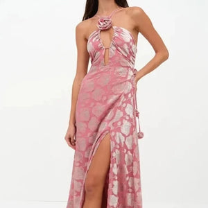 Elevate your style with Dress Rebekah. This exquisite piece boasts a stunning floral print and delicate spaghetti straps that exude elegance and charm. The V-neckline and sleeveless design create a slim, elongated silhouette that is perfect for parties and clubs. Get ready to turn heads in this sweet and sexy dress.