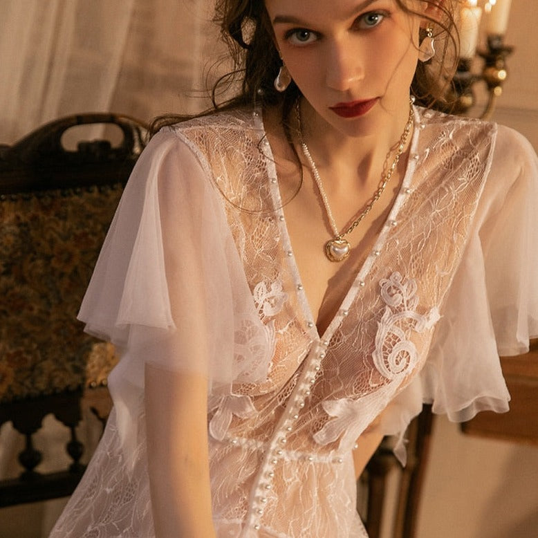 Indulge in pure luxury with Nightgown Alisa. This elegant bridal gown exudes sophistication and is crafted with the finest materials. Feel like a queen on your special day with this exquisite nightgown.