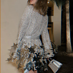 Indulge in the allure of our Dress Star - a growing star shift dress that exudes luxury. Adorned with sexy sequins and a silver mini dress design, this dress is perfect for the sophisticated woman. Elevate your style with elegance and allure.