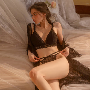 Indulge in luxury with the Ensemble Ursula lingerie set. The three-point open back and lace details add a touch of sensuality, while the chest pads provide support and shaping. Be alluring and confident in this sweet and alluring nightgown.