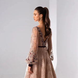 Elevate your formalwear game with our Dress Octavia. The charming flesh-pink color, long sleeves, V-neckline, and stunning A-line silhouette create a timeless and elegant look. With a custom-made fit and sweep train, this dress will make you feel like a true prom queen. Available in various sizes.