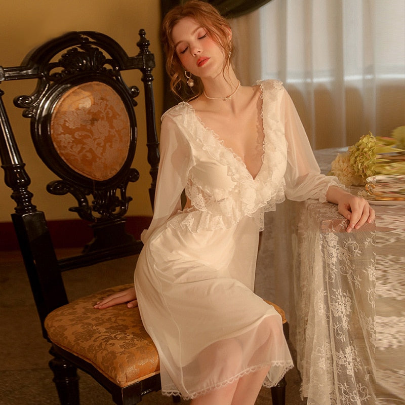 Introducing the Robe du Soir Jeannie, a French-inspired nightgown that exudes elegance and vintage charm. Slip into this luxurious piece and indulge in a taste of luxury, reminiscent of a bygone era. Let the intricate details and French style transport you to a world of sophistication and refinement. Truly a must-have for any discerning individual.